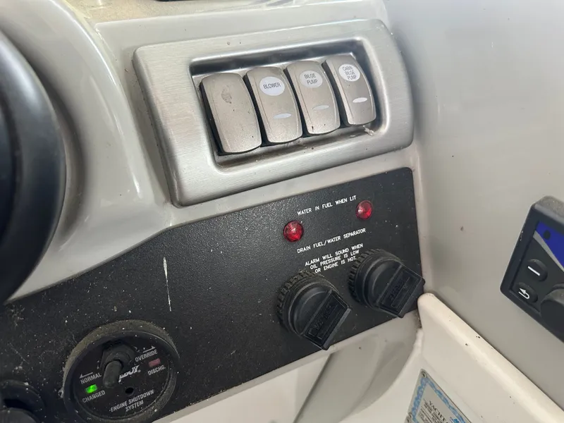 Slide: The Image of Dashboard of a 2008 Formula 37 Performance Cruiser with switches and indicators. - 26