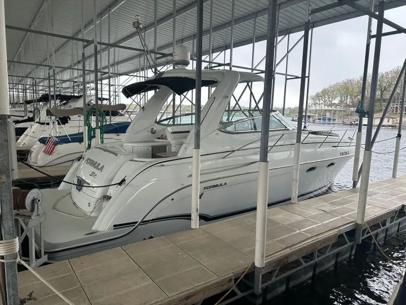 Slide: The Image of 2008 Formula 37 Performance Cruiser docked in marina. - 3