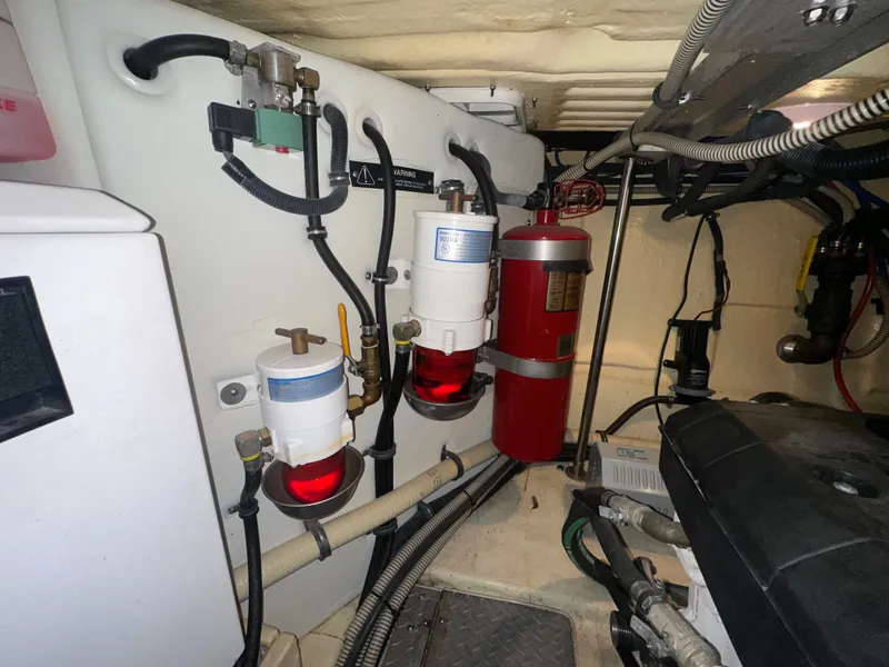 Slide: The Image of Engine room of a 2008 Formula 37 Performance Cruiser with fire extinguisher. - 37