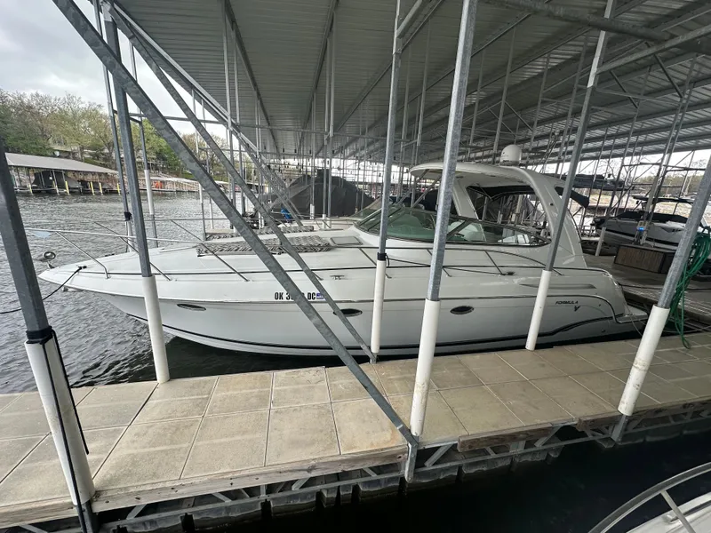 Slide: The Image of 2008 Formula 37 Performance Cruiser docked in marina. - 4