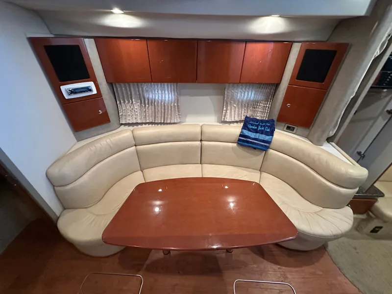 Slide: The Image of Interior of 2008 Formula 37 Performance Cruiser with leather sofa and wooden table. - 49