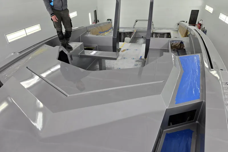 Slide: The Image of Alium 42 yacht construction 2026 with glossy gray surface. - 4
