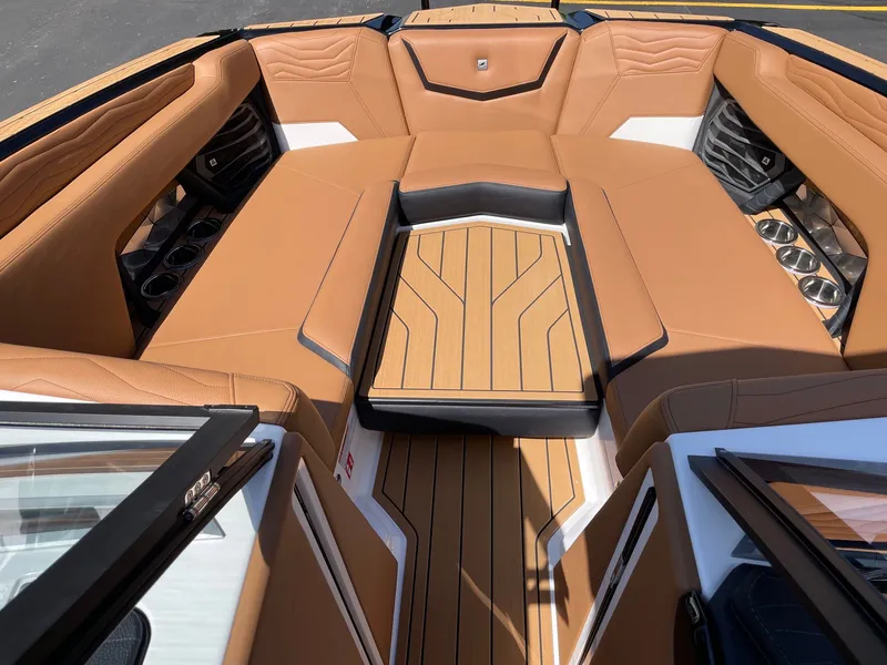 Slide: The Image of 2026 Nautique G25 interior with luxurious leather seating. - 11