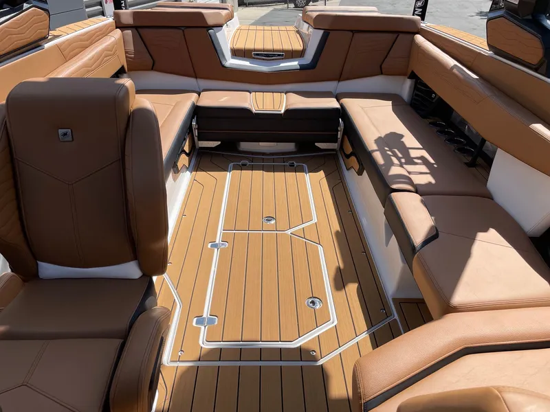 Slide: The Image of Interior of 2026 Nautique G25 with luxurious leather seating. - 12