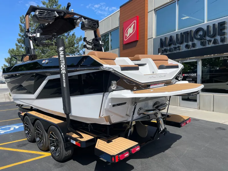 Slide: The Image of 2026 Nautique G25 boat outside a Utah dealership. - 3