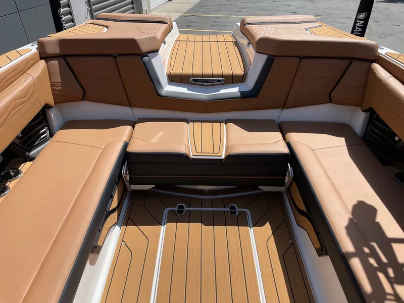 Slide: The Image of Interior of 2026 Nautique G25 with luxurious leather seating. - 8