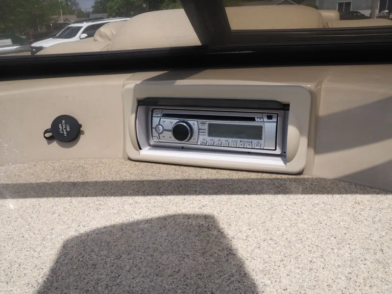 Slide: The Image of 2015 Bennington 2572 RCW boat with built-in radio and USB input. - 16