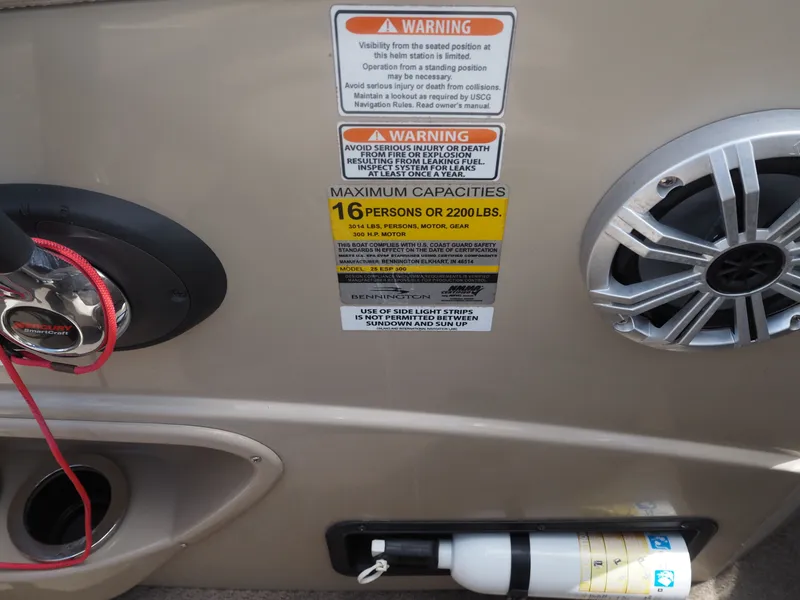 Slide: The Image of Warning labels and capacity sticker on Bennington 2572 RCW boat. - 19
