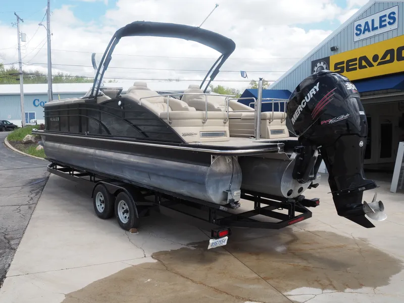 Slide: The Image of 2015 Bennington 2572 RCW pontoon boat with Mercury engine on trailer. - 7