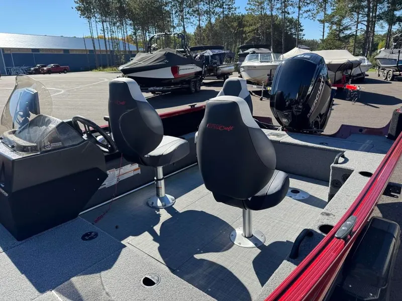 Slide: The Image of 2023 Alumacraft Competitor 165 CS boat with two seats and motor. - 17