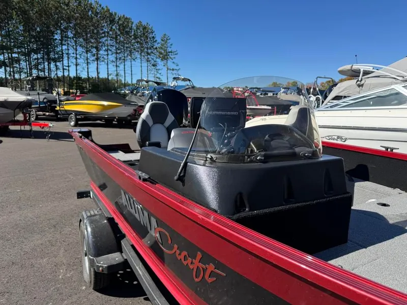 Slide: The Image of 2023 Alumacraft Competitor 165 CS boat on a trailer. - 5
