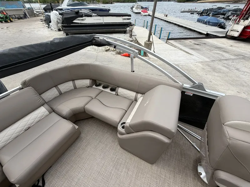 Slide: The Image of Interior of a 2019 Bennington 23SX pontoon boat at the dock. - 10