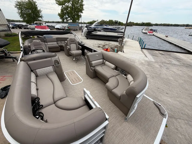 Slide: The Image of Interior of a 2019 Bennington 23SX pontoon boat at the dock. - 5