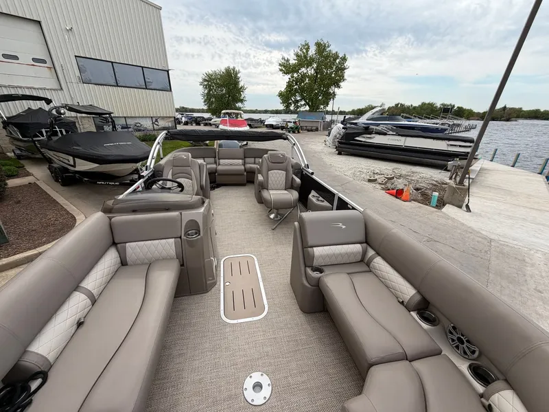 Slide: The Image of Interior view of a 2019 Bennington 23SX pontoon boat at the dock. - 6