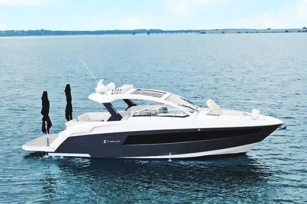 The Image of 2018 Cruisers Yachts 390 Express Coupe on calm water, side view. - 1