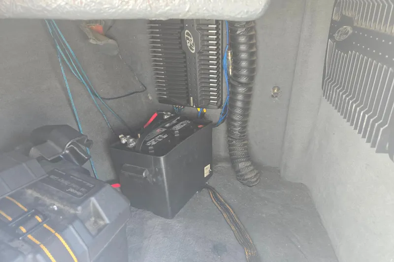 Slide: The Image of 2003 Malibu Sunscape 21 LSV interior showing battery and wiring setup. - 17