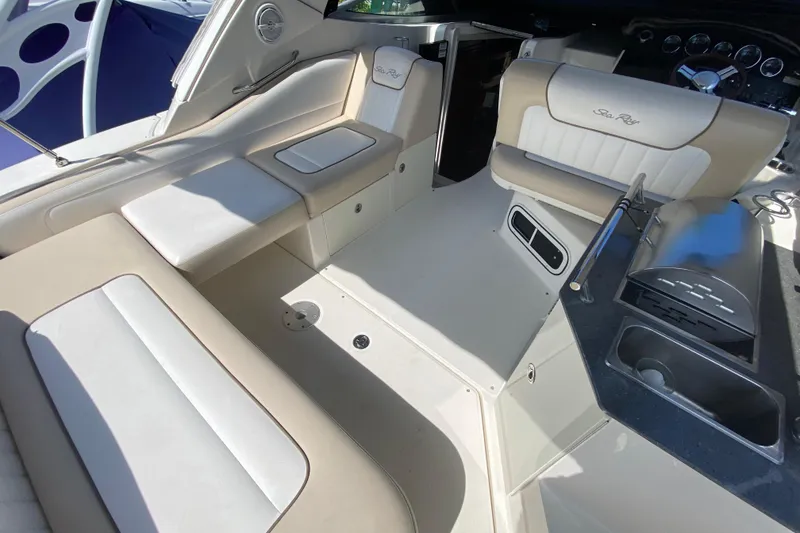 Slide: The Image of Luxurious interior of a 2003 Monterey 302 Cruiser with plush seating and sleek design. - 32