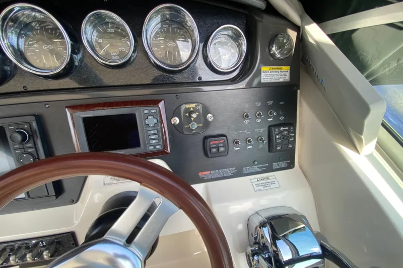 Slide: The Image of Dashboard of a 2003 Monterey 302 Cruiser with gauges and controls. - 40