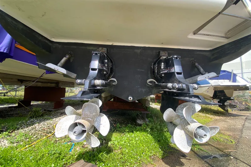 Slide: The Image of Rear view of a 2003 Monterey 302 Cruiser boat with dual propellers. - 53