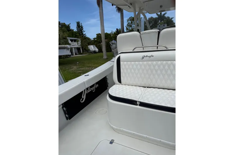 Slide: The Image of 2006 Yellowfin 34 Offshore boat interior with white quilted seating. - 41