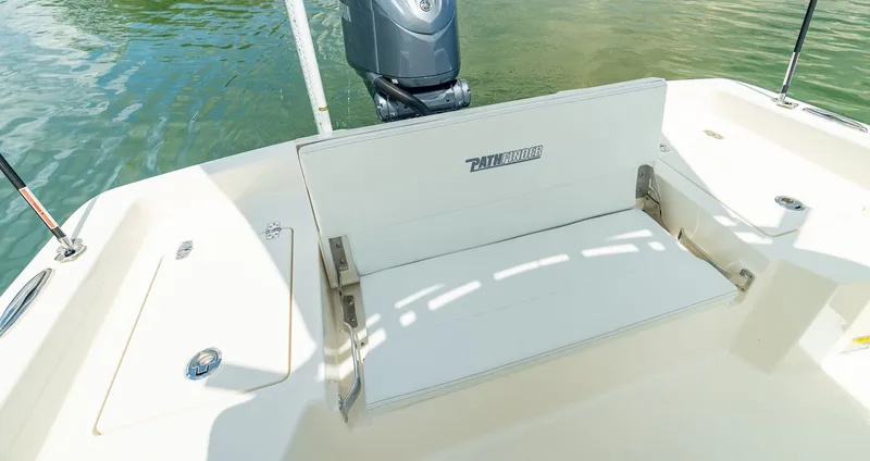 Slide: The Image of Pathfinder 2400 TRS 2026 boat with bench seat and outboard motor. - 9