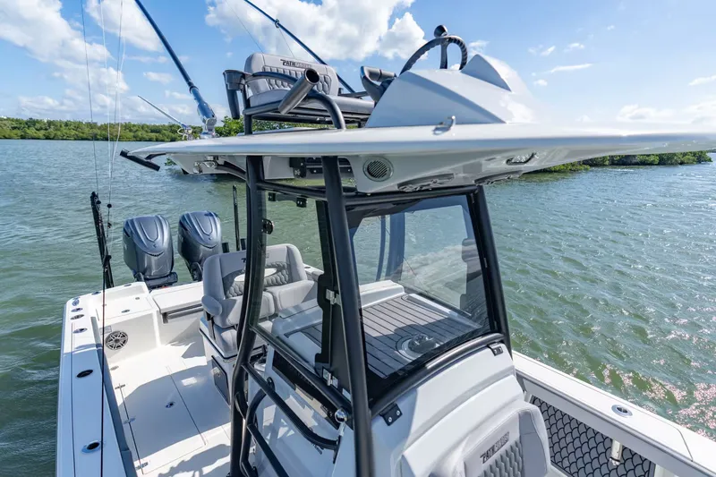 Slide: The Image of Pathfinder 2800 Hybrid 2026 on a lake under sunny skies. - 12