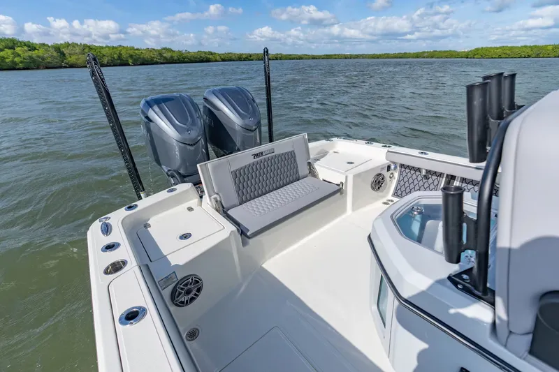 Slide: The Image of Pathfinder 2800 Hybrid 2026 with dual outboard motors on open water. - 7
