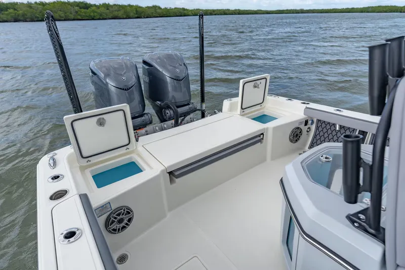 Slide: The Image of Pathfinder 2800 Hybrid 2026 with dual outboard motors on calm water. - 8