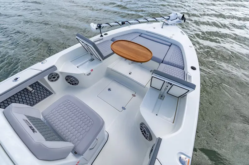 Slide: The Image of Pathfinder 2800 Hybrid 2026 with stylish interior on the water. - 18