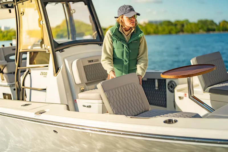 Slide: The Image of Woman on Pathfinder 2800 Hybrid boat, 2026 model, at sea. - 6