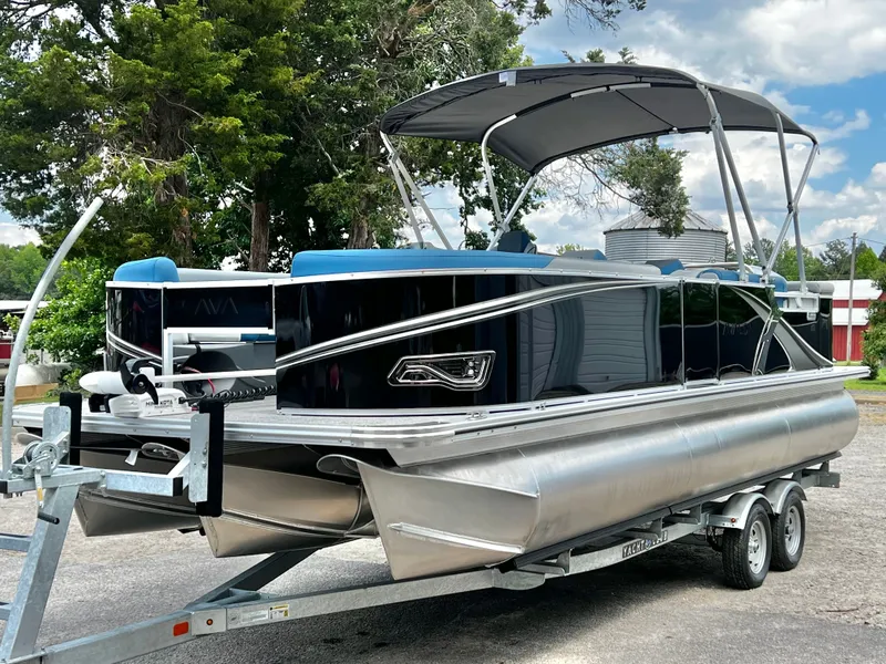 The Image of 2026 Avalon LSZ 23' Cruise Triple-Toon on trailer, in stock, $67,924. - 1