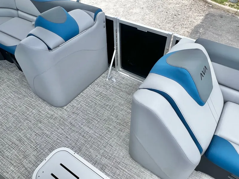 Slide: The Image of Interior of Avalon LSZ 23' Cruise Triple-Toon 2026, gray and blue upholstery. - 12