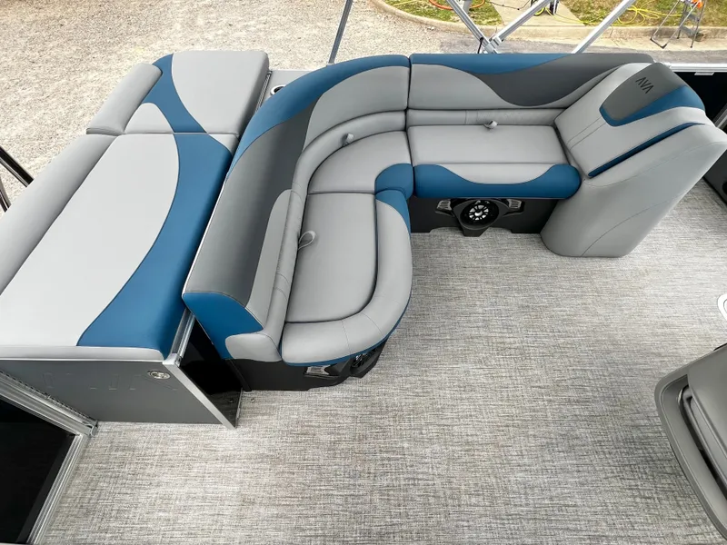 Slide: The Image of Interior of Avalon LSZ 23' Cruise Triple-Toon 2026, gray and blue upholstery. - 16