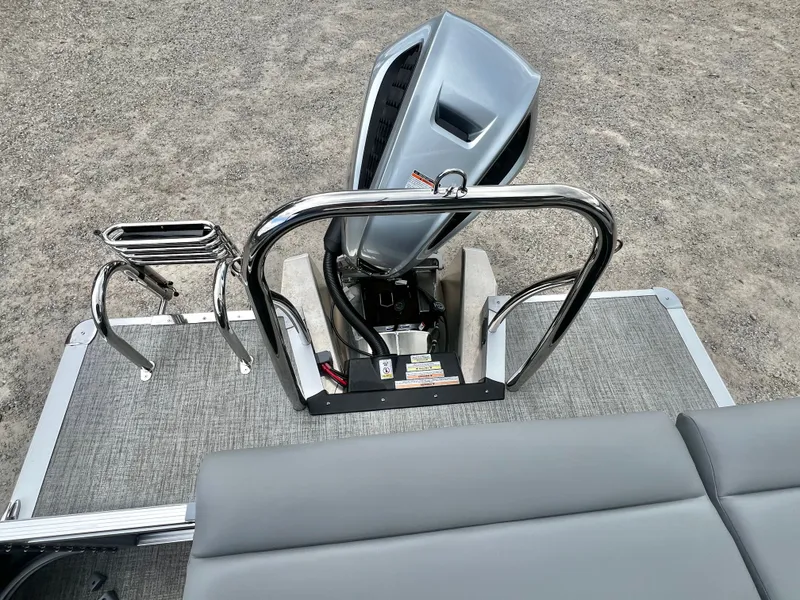 Slide: The Image of Avalon LSZ 23' Cruise Triple-Toon 2026 with motor and ladder. - 17