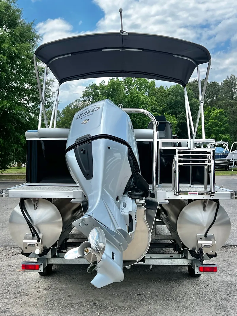 Slide: The Image of 2026 Avalon LSZ 23' Cruise Triple-Toon with outboard motor, in stock, $67,924. - 4