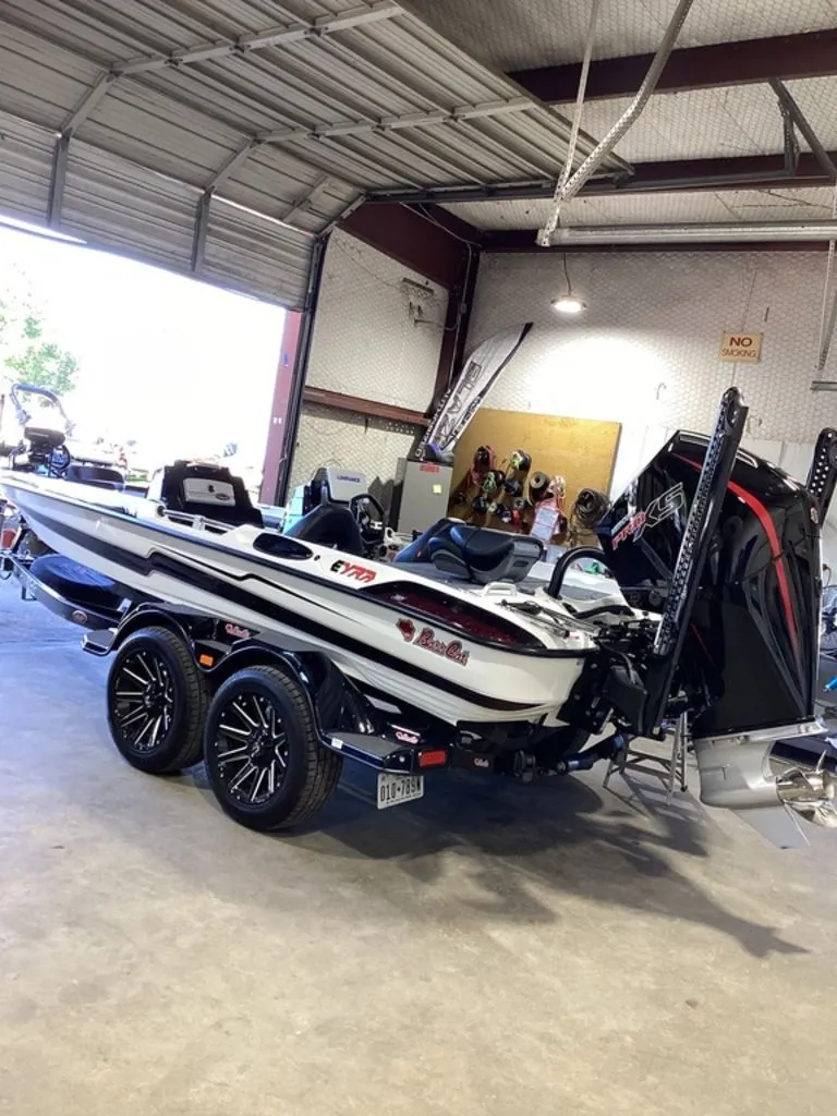 The Image of 2025 Bass Cat Eyra boat parked in a garage. - 1