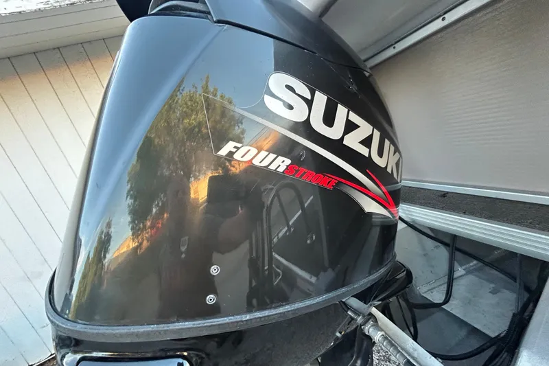 Slide: The Image of Suzuki four-stroke outboard motor on 2008 Premier Sunsation 225 LTD. - 2