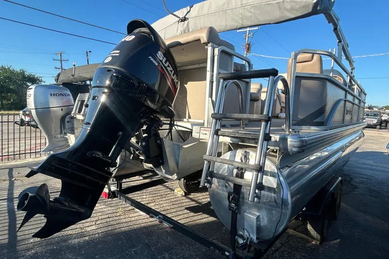 Slide: The Image of 2008 Premier Marine SunSation 225 LTD pontoon boat with Suzuki outboard motor. - 3
