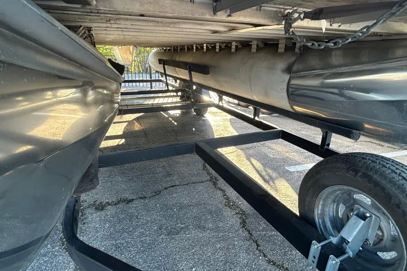 Slide: The Image of Underneath view of a 2008 Premier Marine SunSation 225 LTD pontoon boat on a trailer. - 8