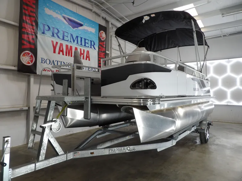 Slide: The Image of 2026 Avalon Venture Quad Fish 19' pontoon boat in showroom. - 12