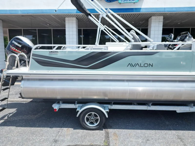 Slide: The Image of Avalon VNT VRB21 2026 pontoon boat with Yamaha engine on trailer. - 16