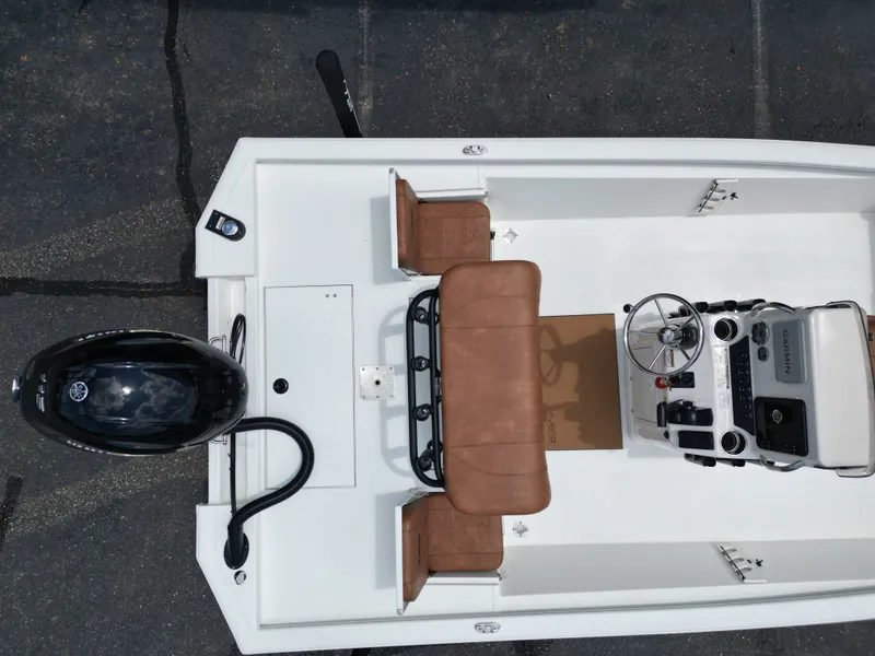 Slide: The Image of Aerial view of 2026 Avid 19 FSX boat with brown seats. - 14