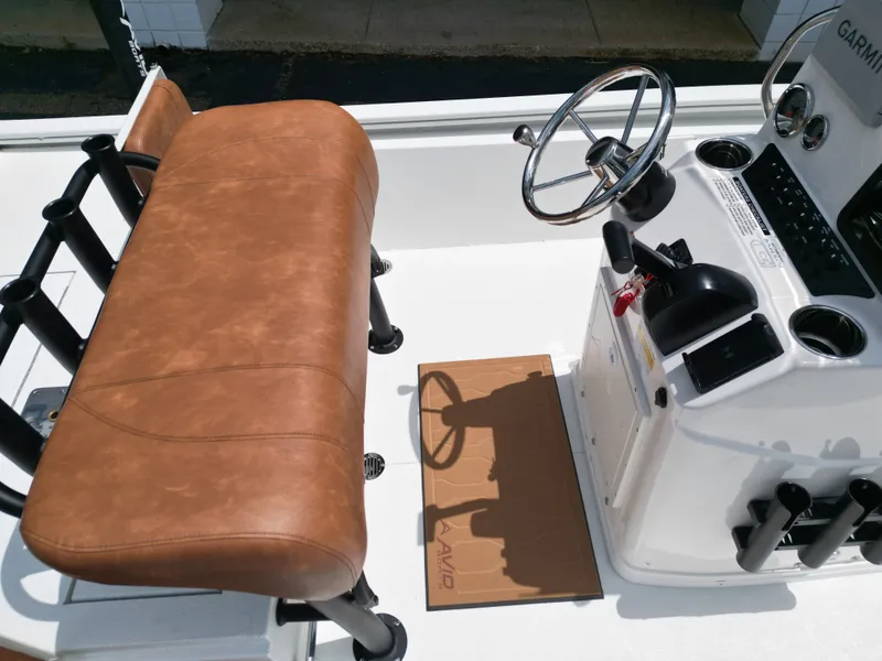 Slide: The Image of Interior of Avid 19 FSX boat, 2026 model, featuring brown seat. - 19