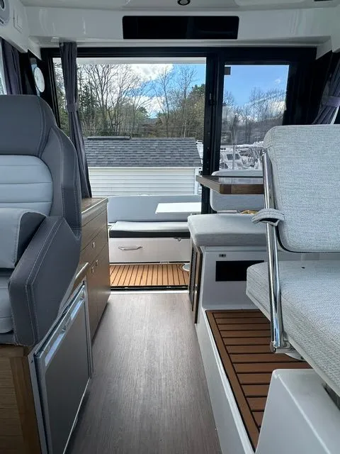 Slide: The Image of Interior of 2021 Jeanneau NC 895 yacht with modern seating. - 14