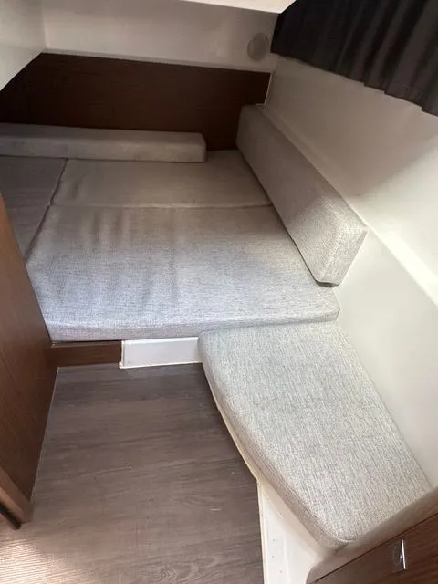 Slide: The Image of Interior of Jeanneau NC 895, 2021, featuring gray upholstery. - 17