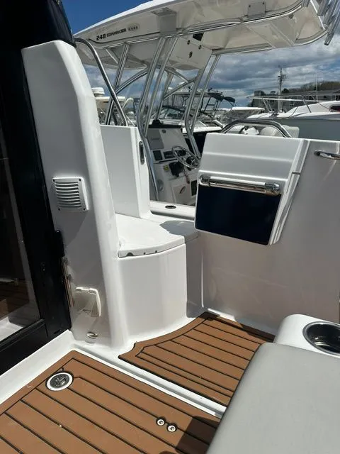 Slide: The Image of Jeanneau NC 895 2021, modern boat cockpit with wood flooring. - 22