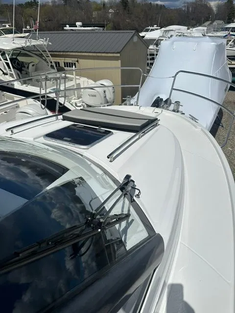 Slide: The Image of Jeanneau NC 895 boat, 2021 model, parked on a boat deck. - 24
