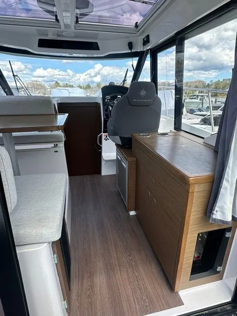 Slide: The Image of Interior of 2021 Jeanneau NC 895 yacht with modern amenities. - 8