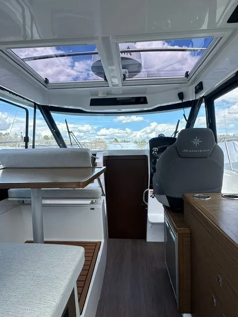 Slide: The Image of Interior of 2021 Jeanneau NC 895 yacht with panoramic windows. - 9