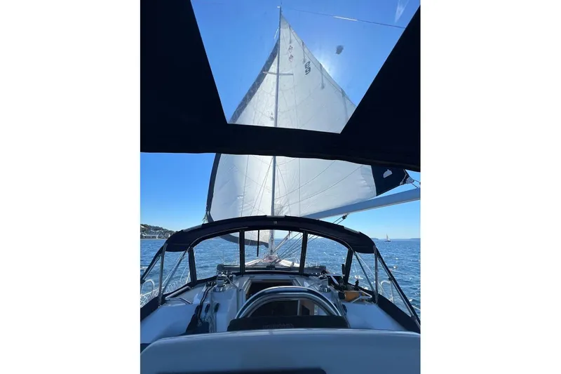 Slide: The Image of Sailing on a 2012 Catalina 355 yacht with open sails on a sunny day. - 7